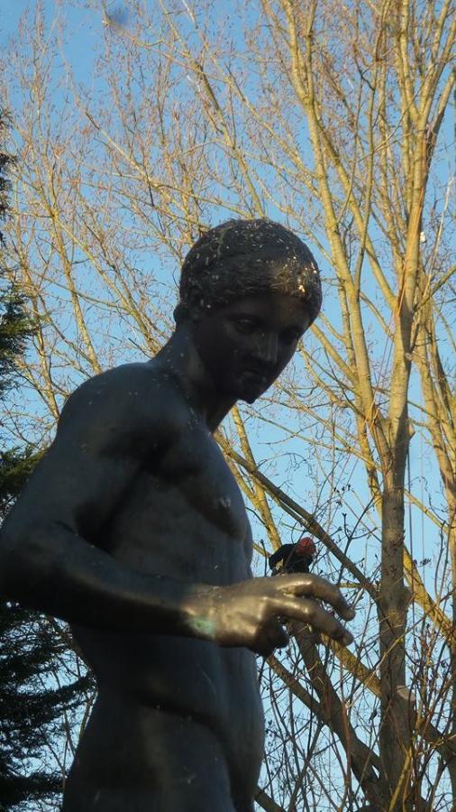 sitting-in-statues-hand---water-gardens.jpg
